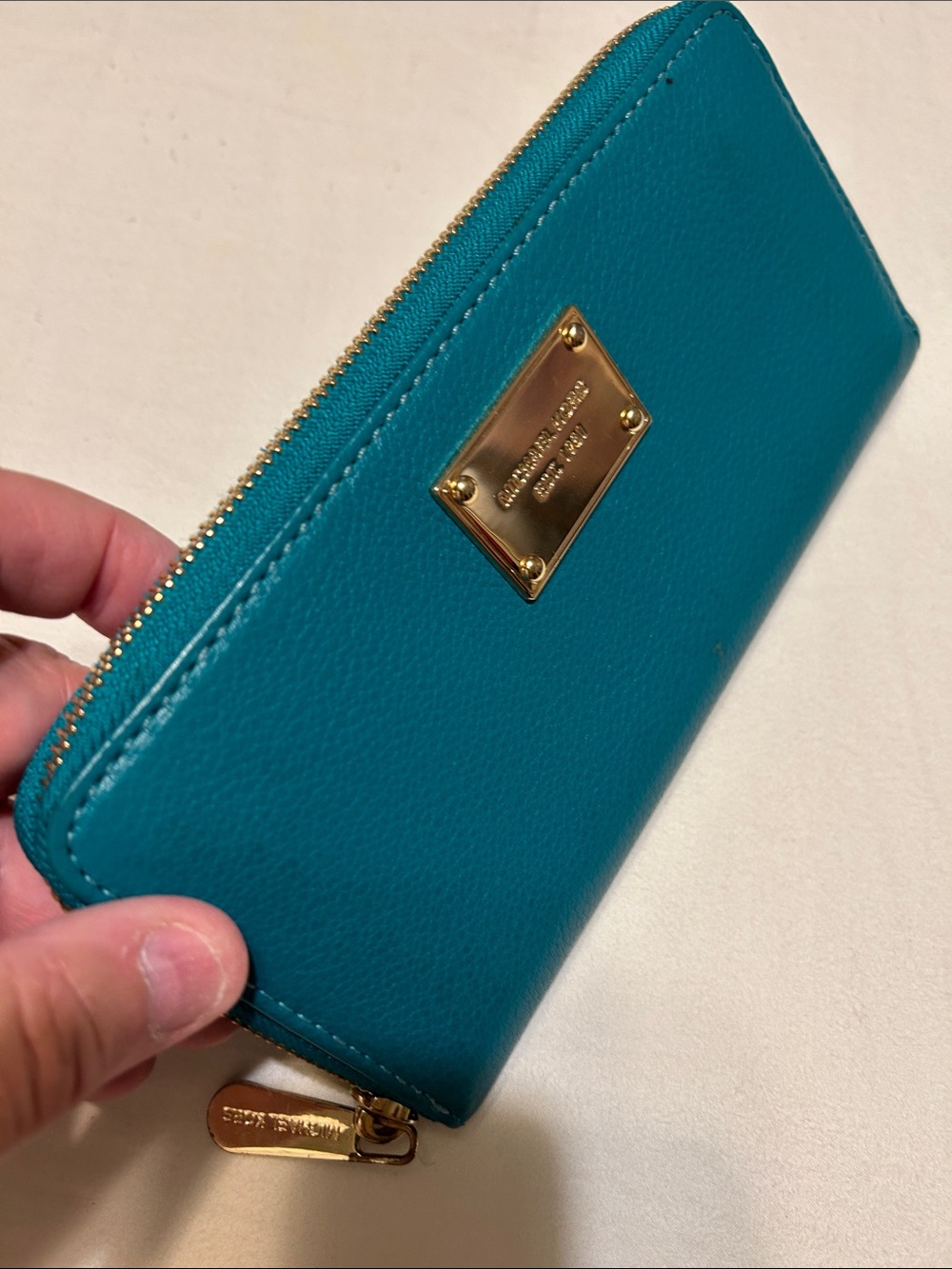 Michael Kors Teal Zip-Around Wallet with Gold Plaque